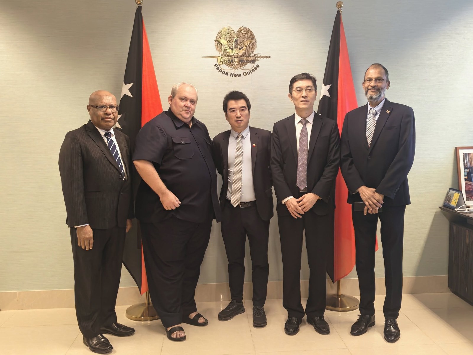 Foreign Minister Tkatchenko (second from left) with Ambassador Yang (second from right) and the PetroChina delegation.